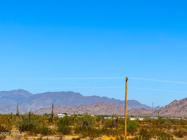 a view of a lake with a mountain in the background