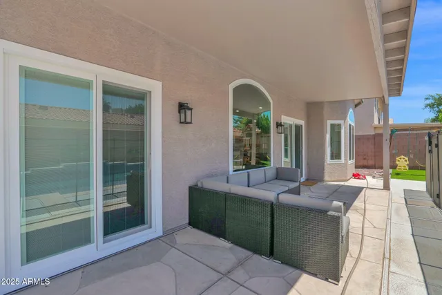 a living room with furniture and a window