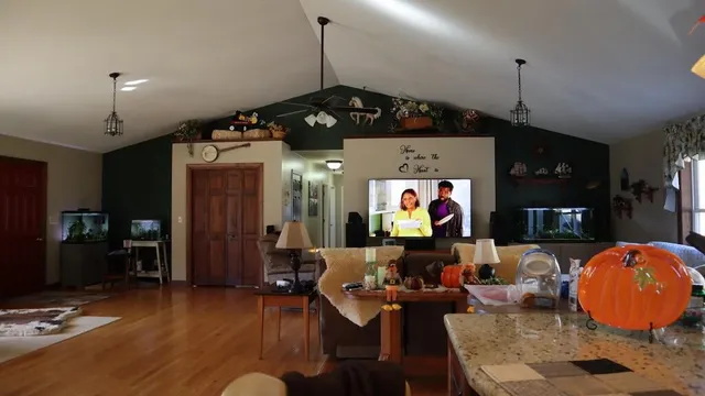 a living room with furniture and outdoor space