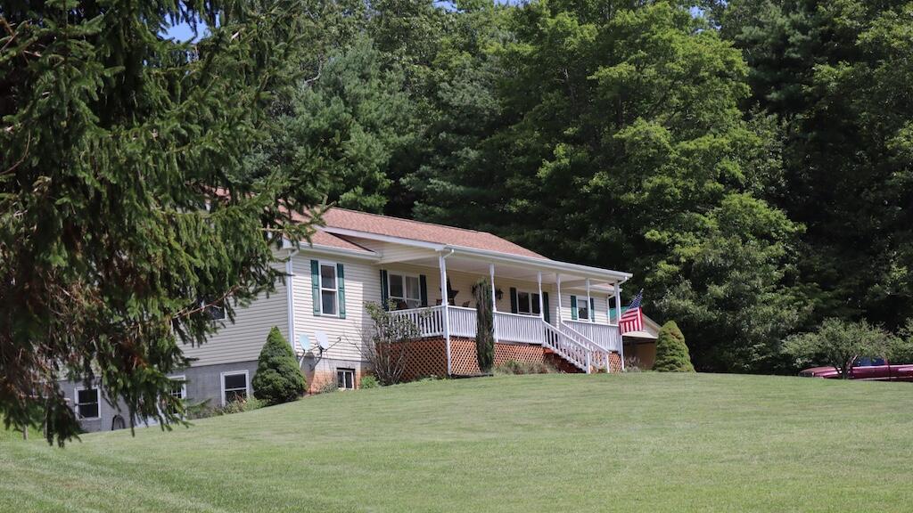 1247 Cannady School Road Southeast Floyd, VA 24091 - Photo 2 of 54 a view of a house with a yard