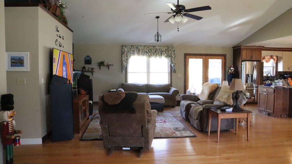 1247 Cannady School Road Southeast Floyd, VA 24091 - Photo 24 of 54 a living room with furniture chandelier and a window