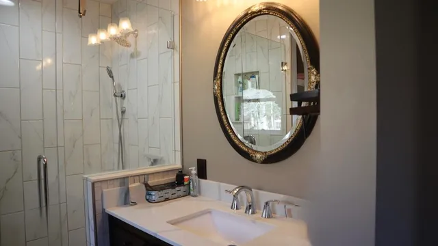 a view of hallway with chandelier and wooden floor