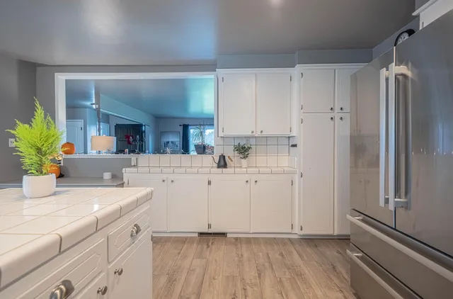 a view of a livingroom from a hallway