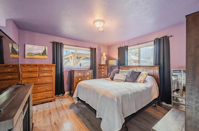 a bathroom with a sink double vanity and a mirror
