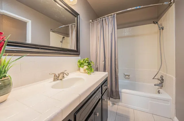 a view of balcony with wooden floor and outdoor seating