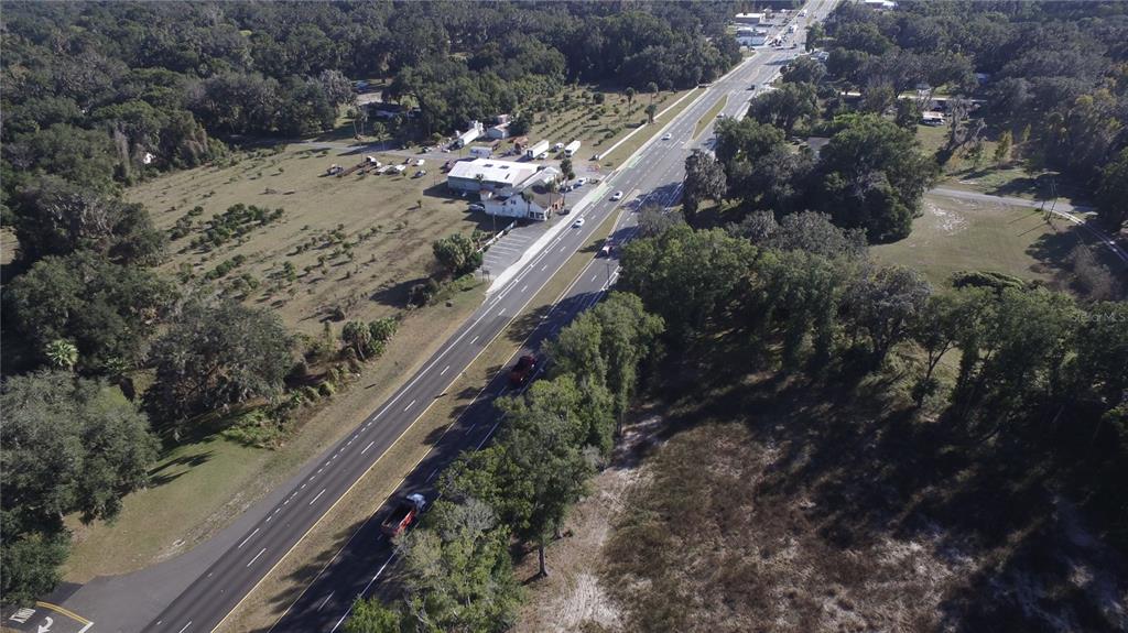 301 Tbd Citra, FL 32113 - Photo 20 of 36 a view of a yard with wooden stairs