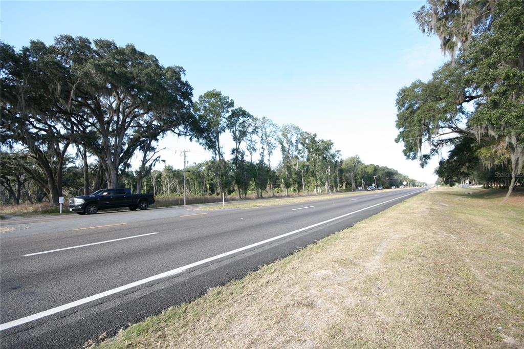 301 Tbd Citra, FL 32113 - Photo 27 of 36 a view of a road with a trees