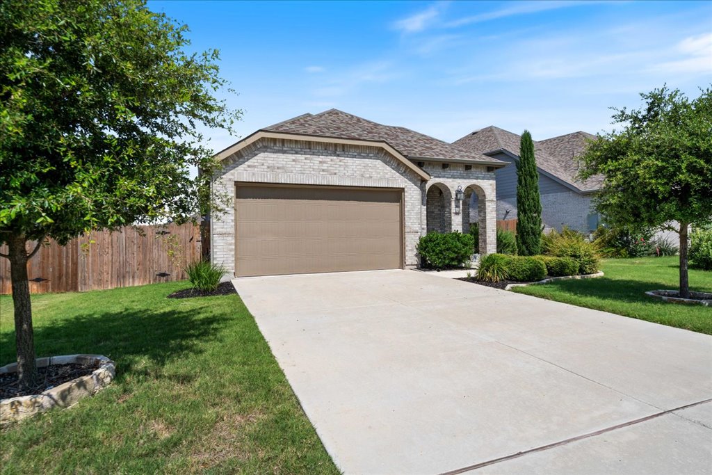 7912 Prairie Rye Drive Lago Vista, TX 78645 - Photo 27 of 37 Plenty of off-street parking with this 2 car garage and driveway parking