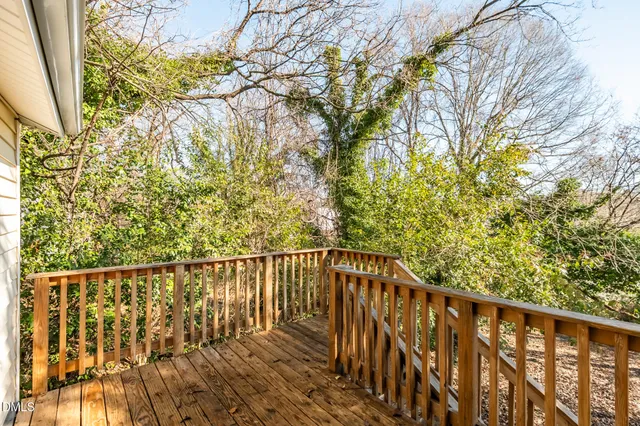 a view of a storage and utility room with washer and dryer