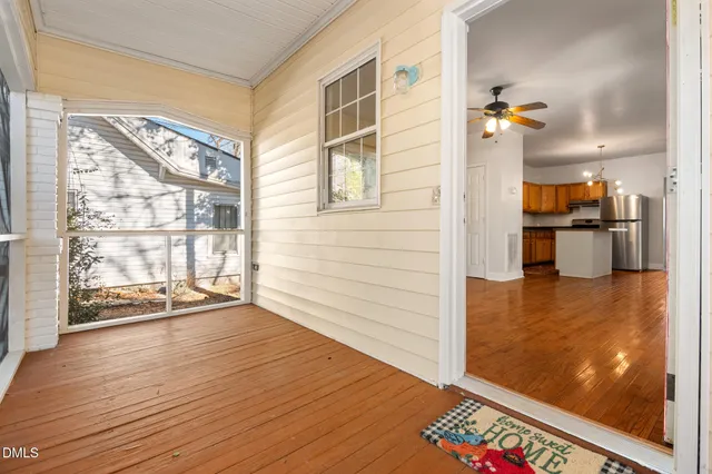 a view of a living room and hardwood floor