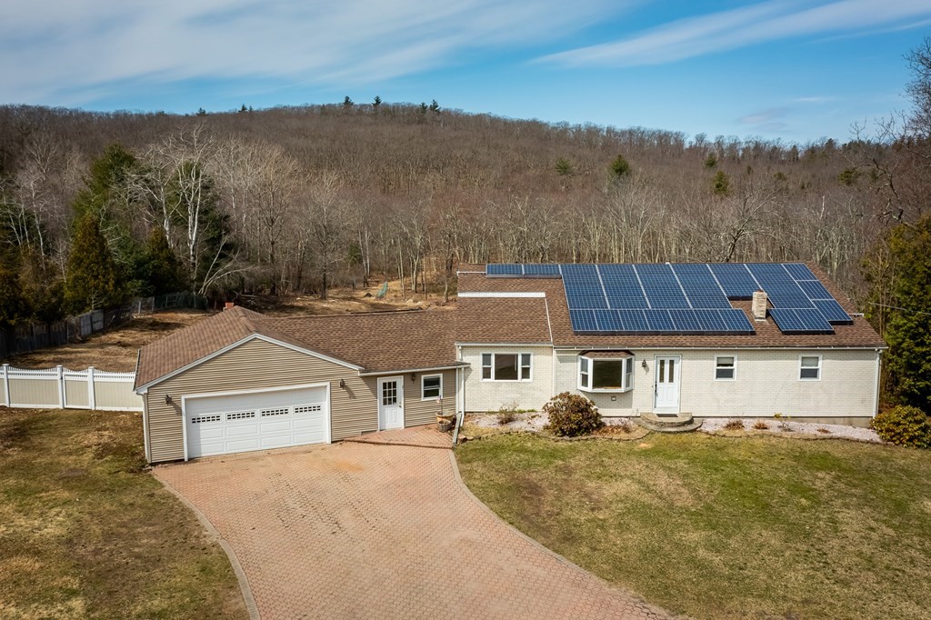 127 Upper Hampden Road Monson, MA 01057 - Photo 1 of 42 an aerial view of a house with a garden