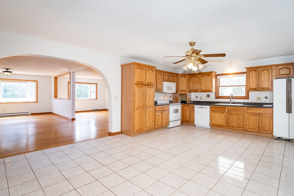 127 Upper Hampden Road Monson, MA 01057 - Photo 24 of 42 a open kitchen with cabinets a sink and appliances