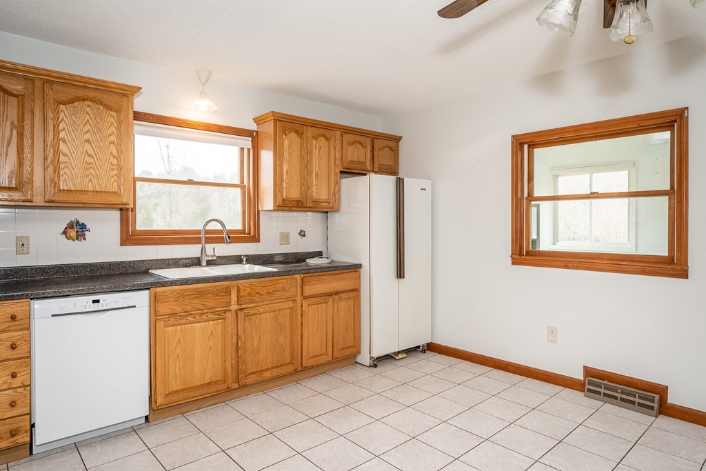 127 Upper Hampden Road Monson, MA 01057 - Photo 26 of 42 a kitchen with stainless steel appliances granite countertop a refrigerator and a sink
