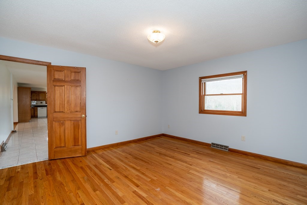 127 Upper Hampden Road Monson, MA 01057 - Photo 31 of 42 a view of empty room with wooden floor