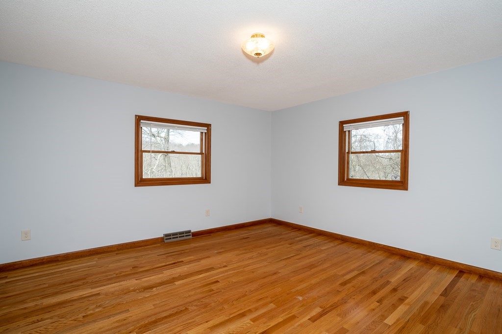 127 Upper Hampden Road Monson, MA 01057 - Photo 32 of 42 a view of a room with wooden floor and window