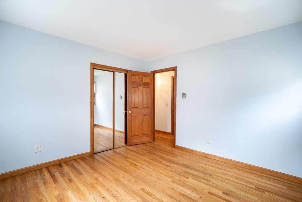 127 Upper Hampden Road Monson, MA 01057 - Photo 35 of 42 a view of empty room with wooden floor and fan