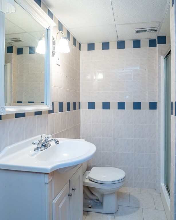 127 Upper Hampden Road Monson, MA 01057 - Photo 42 of 42 a bathroom with a sink toilet and a mirror