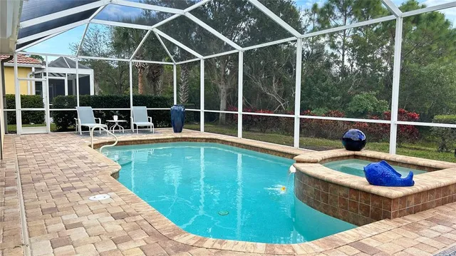 a view of a chairs and table in the patio