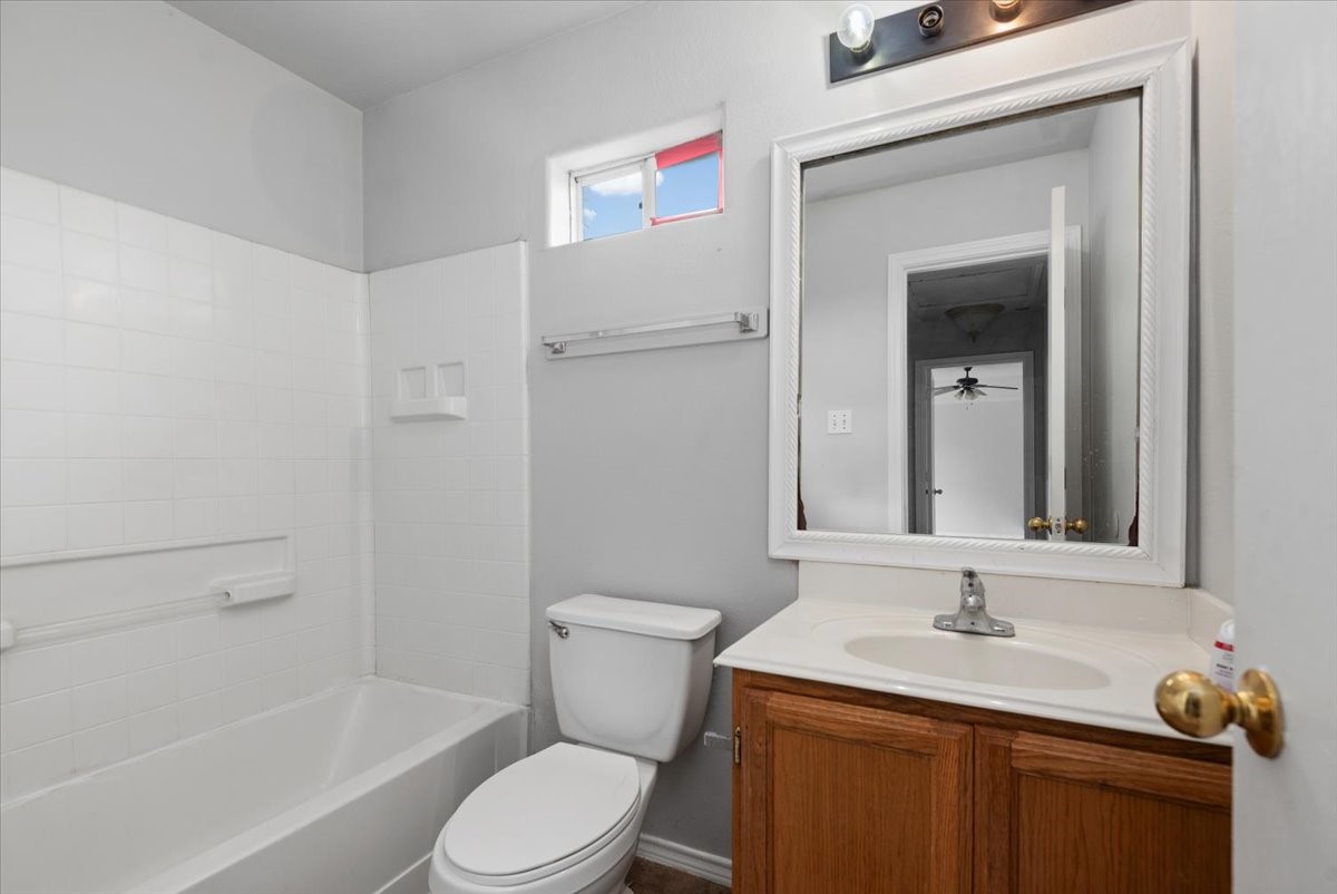 5518 Rio Alamo Street Rosharon, TX 77583 - Photo 16 of 25 a bathroom with a granite countertop sink toilet and shower