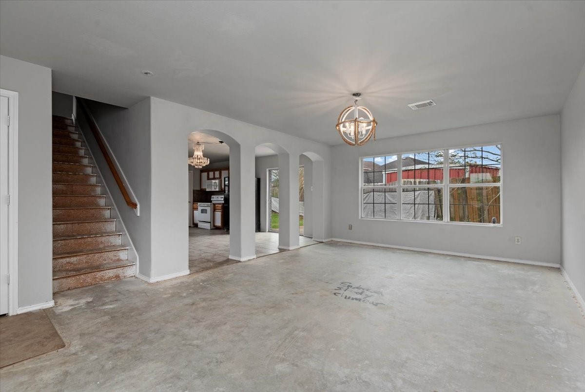 5518 Rio Alamo Street Rosharon, TX 77583 - Photo 4 of 25 a view of an empty room with a fireplace