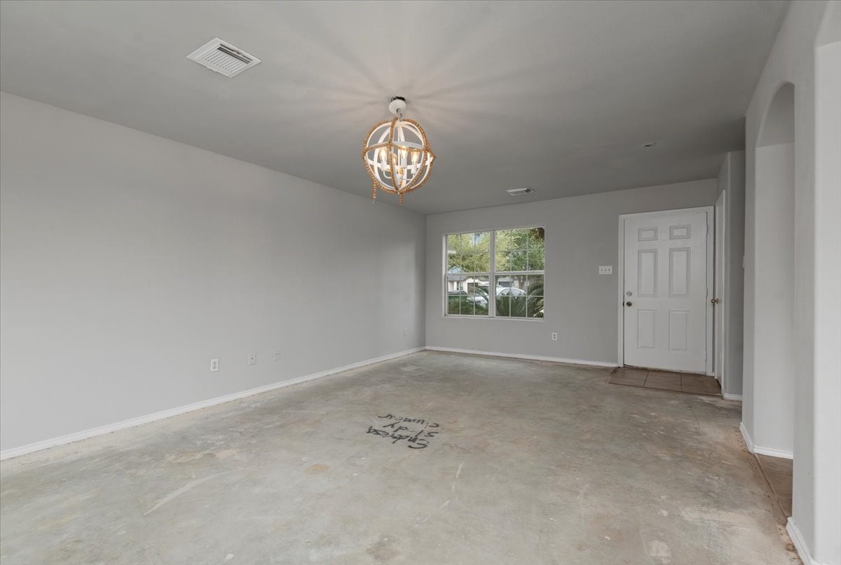 5518 Rio Alamo Street Rosharon, TX 77583 - Photo 6 of 25 an empty room with a window
