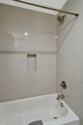 a bathroom with a bathtub