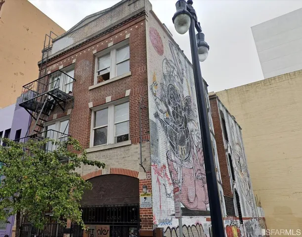a front view of a building with street