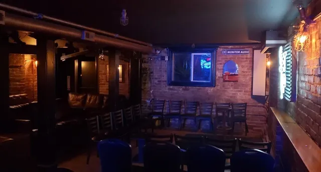 a room with furniture and lamp