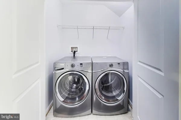 a view of utility room with washer and dryer