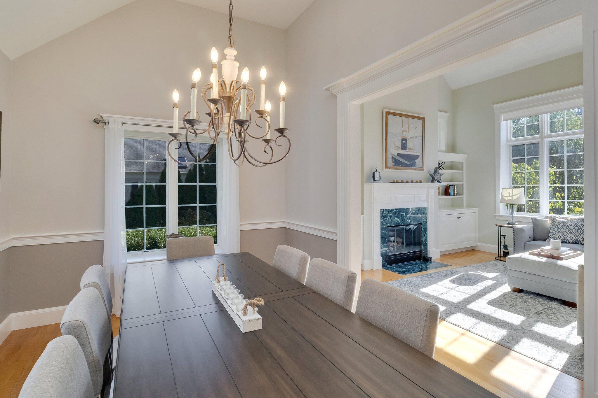 15 Regatta Drive Mashpee, MA 02649 - Photo 12 of 55 a living room with furniture and a fireplace