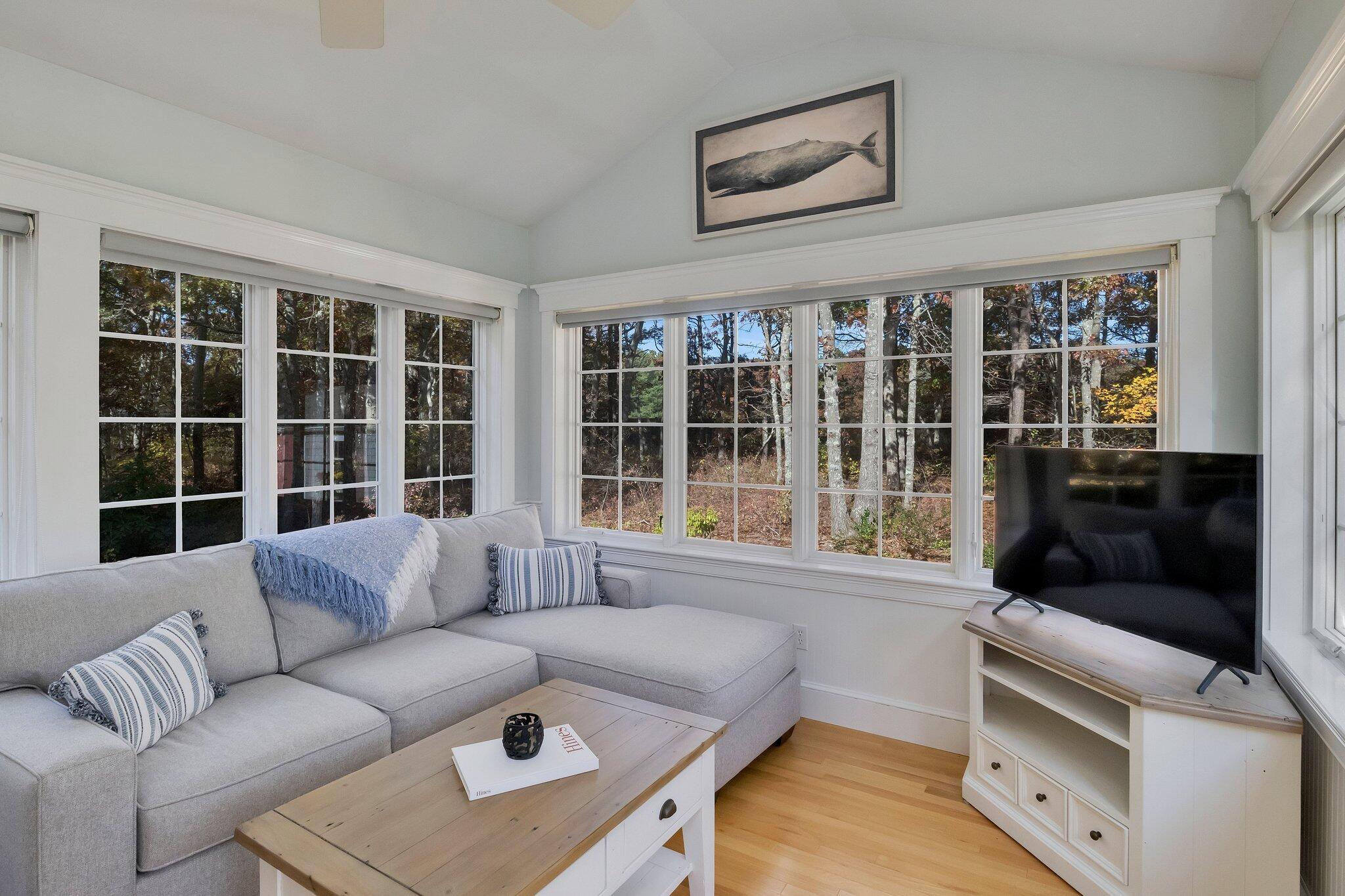 15 Regatta Drive Mashpee, MA 02649 - Photo 18 of 55 a living room with furniture and a large window