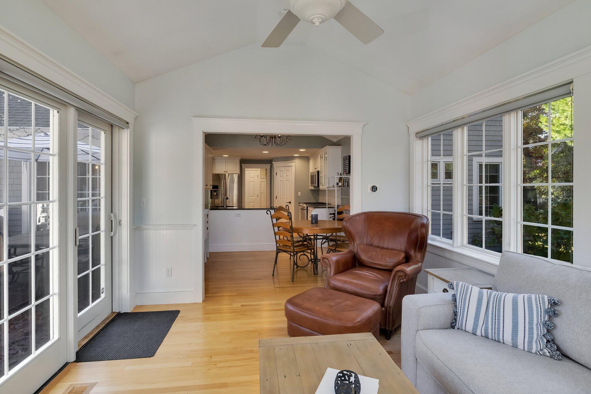 15 Regatta Drive Mashpee, MA 02649 - Photo 19 of 55 a living room with furniture and two windows