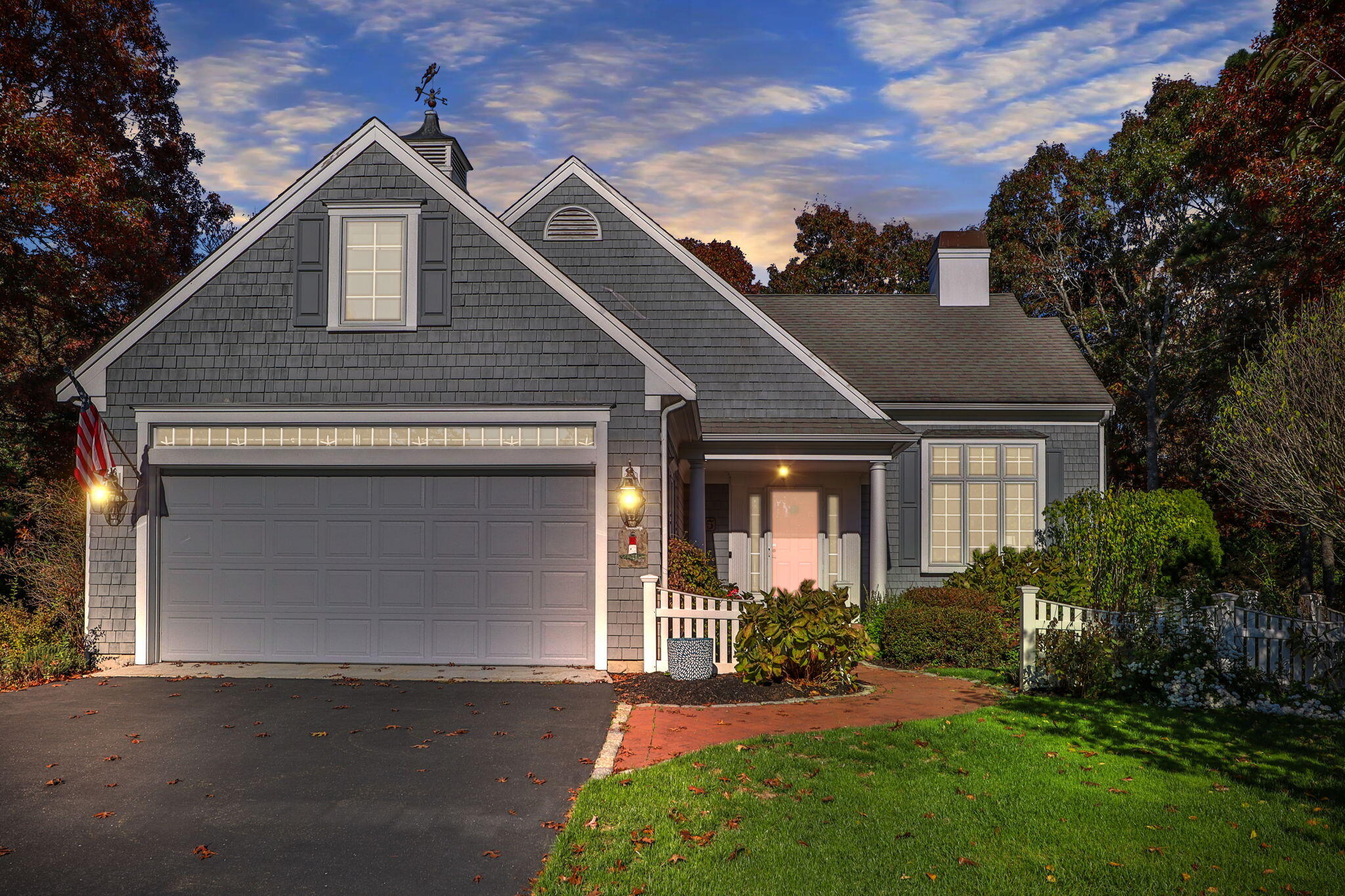 15 Regatta Drive Mashpee, MA 02649 - Photo 2 of 55 a front view of a house with a yard