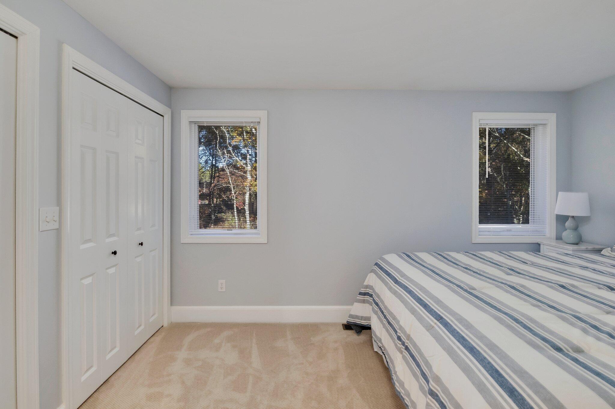 15 Regatta Drive Mashpee, MA 02649 - Photo 28 of 55 a bedroom with a bed and a window