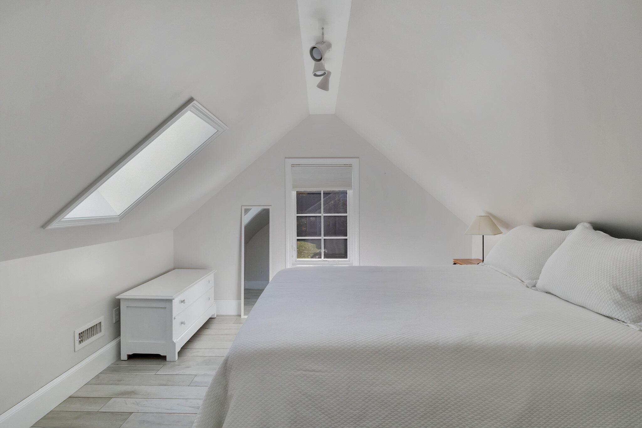 15 Regatta Drive Mashpee, MA 02649 - Photo 35 of 55 a bedroom with a bed and a large window