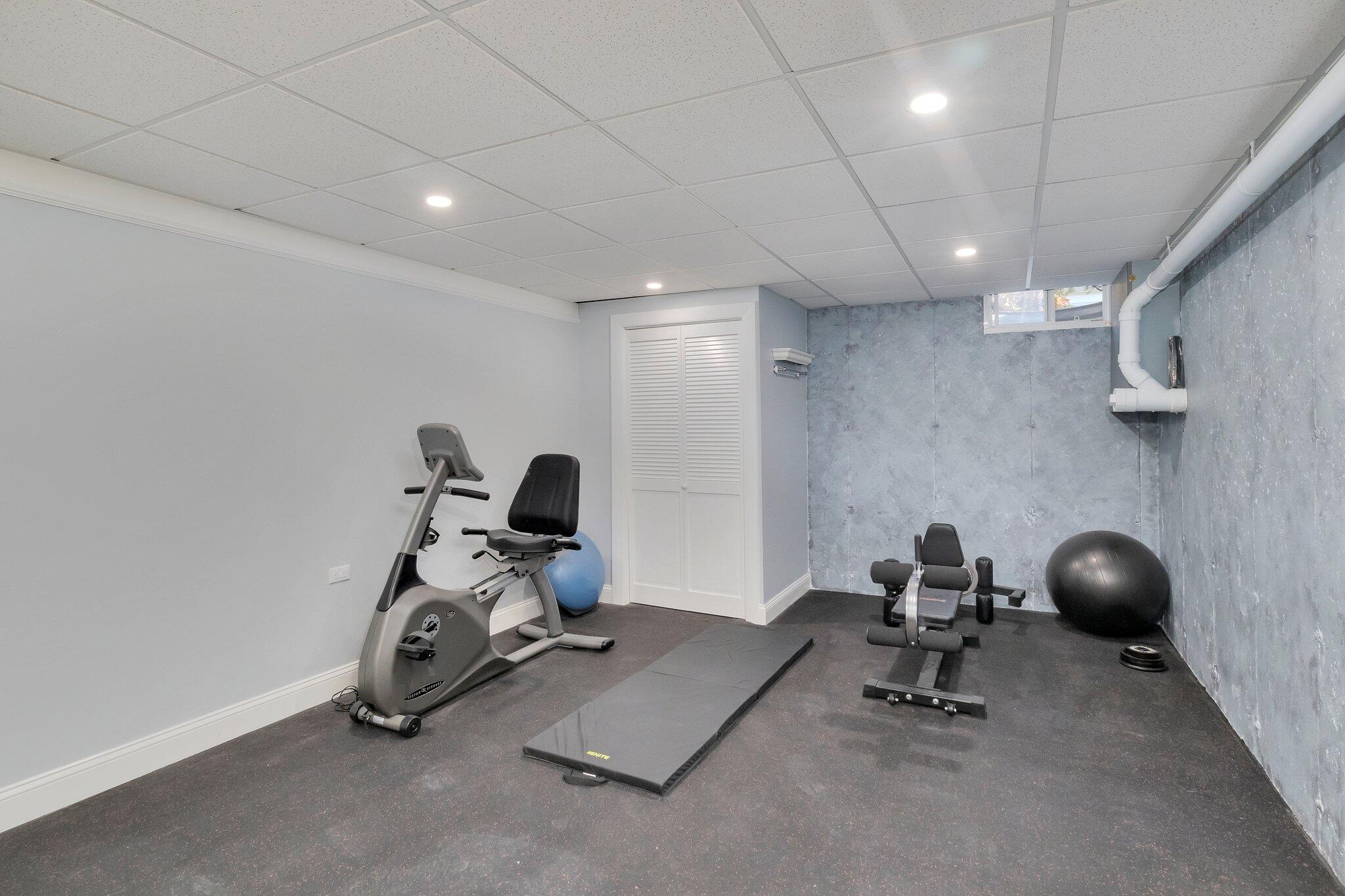 15 Regatta Drive Mashpee, MA 02649 - Photo 36 of 55 a view of a room with gym equipment