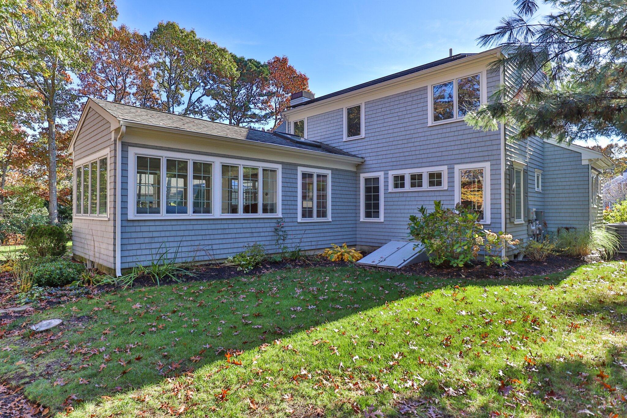 15 Regatta Drive Mashpee, MA 02649 - Photo 41 of 55 a view of a house with garden and yard