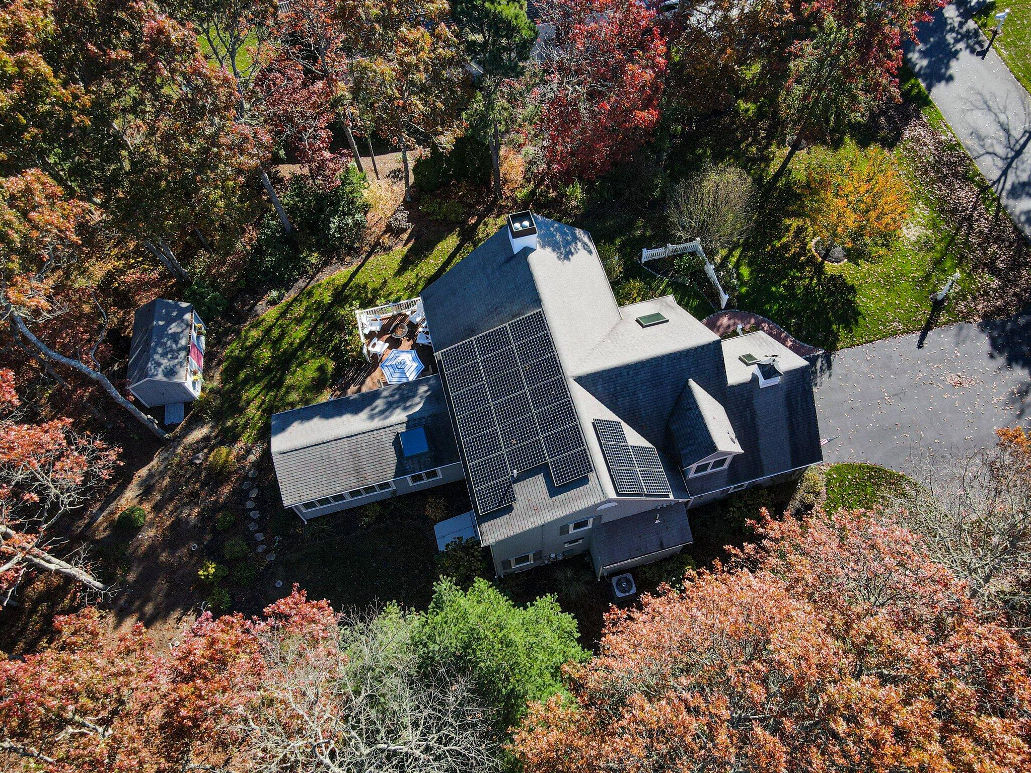15 Regatta Drive Mashpee, MA 02649 - Photo 51 of 55 an aerial view of a house with a yard