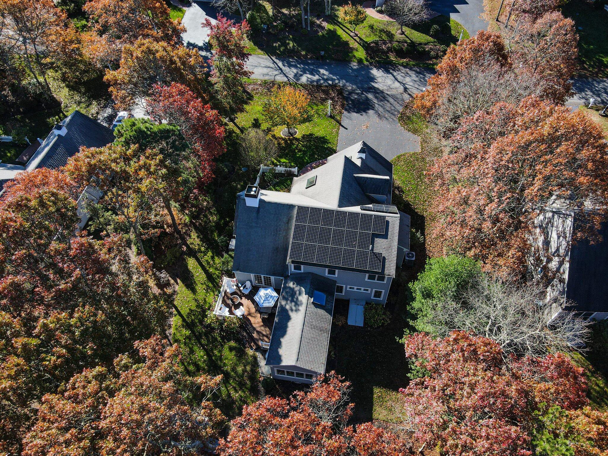15 Regatta Drive Mashpee, MA 02649 - Photo 52 of 55 a view of a house with a yard and a tree