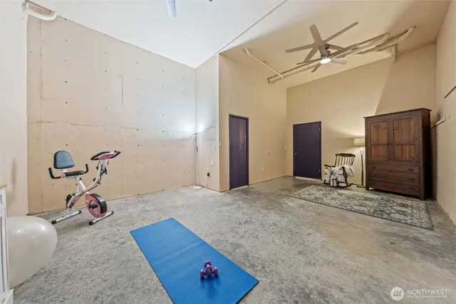 a view of a house with basketball court