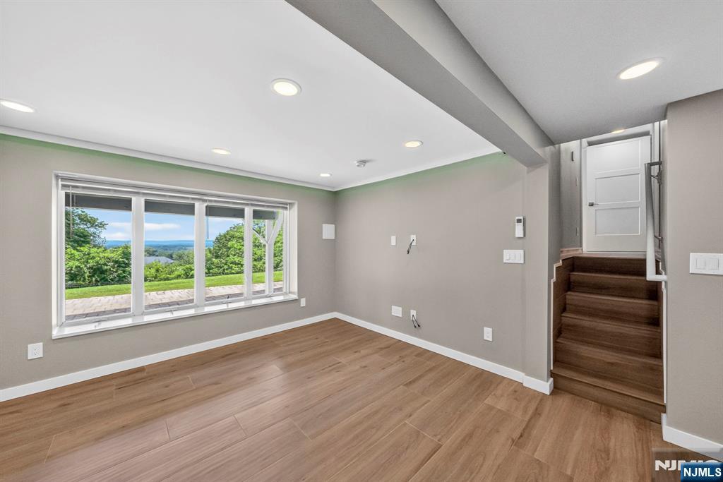 57 Hemlock Road Little Falls, NJ 07424 - Photo 33 of 50 a view of wooden floor and windows in a room