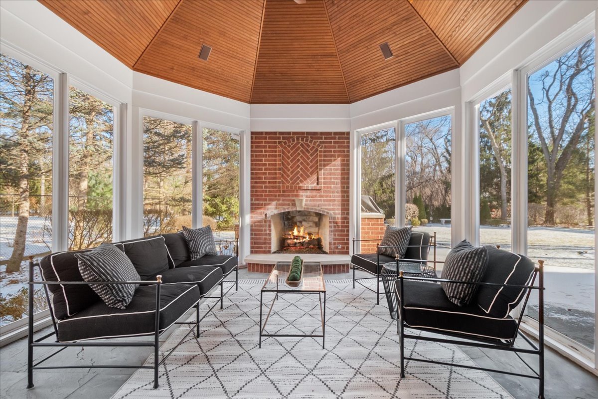 861 Bell Lane Winnetka, IL 60093 - Photo 18 of 57 a living room with furniture and a large window