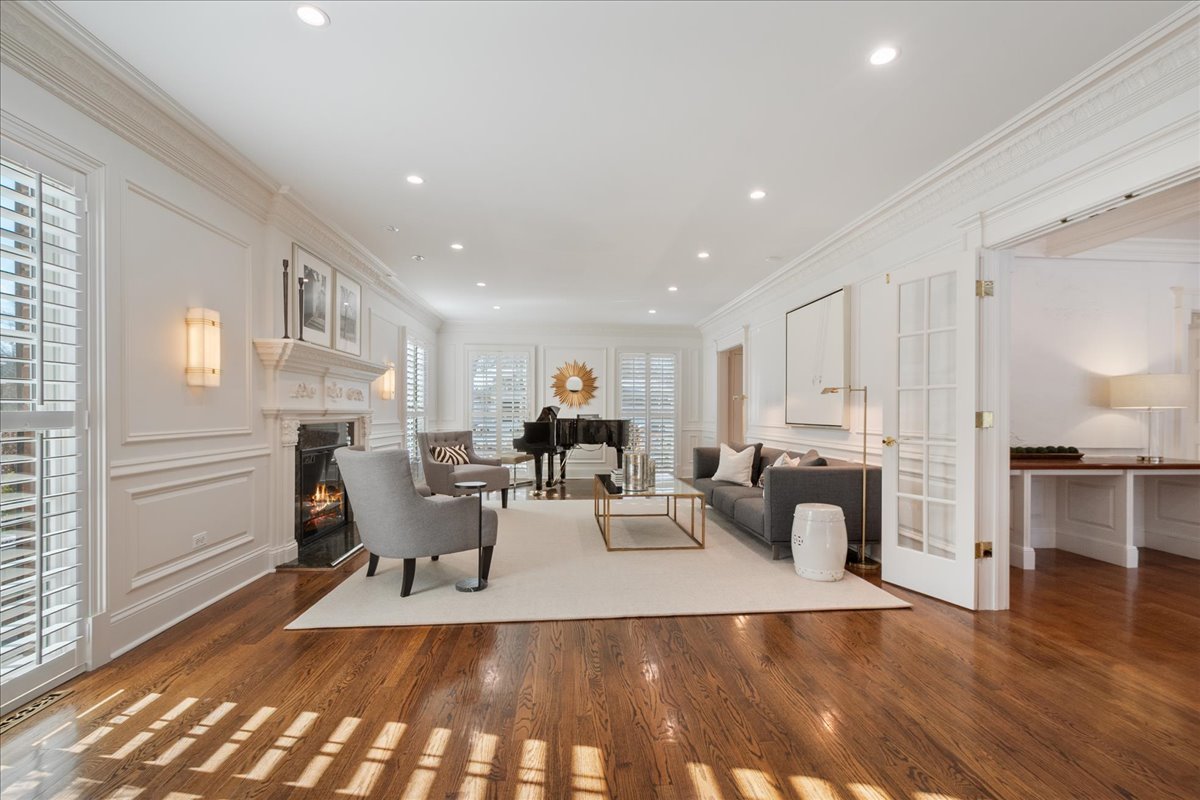 861 Bell Lane Winnetka, IL 60093 - Photo 24 of 57 a living room with furniture and a wooden floor