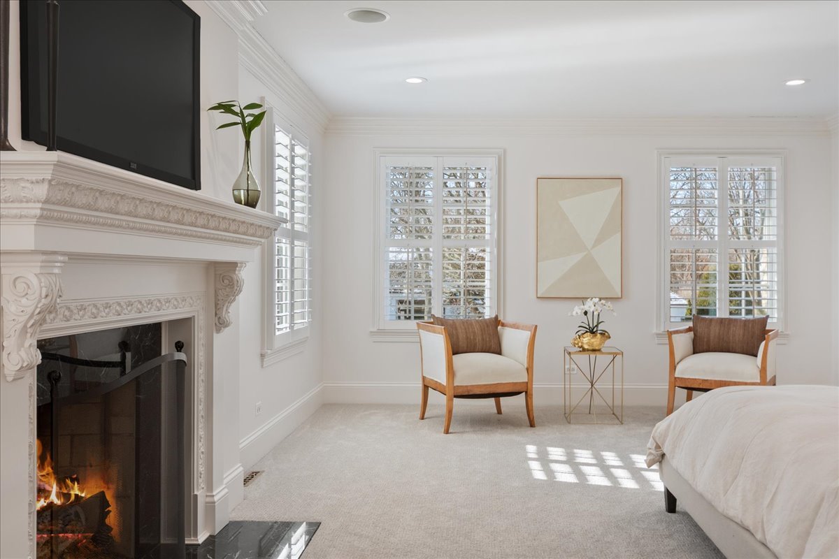 861 Bell Lane Winnetka, IL 60093 - Photo 31 of 57 a living room with furniture and a fireplace