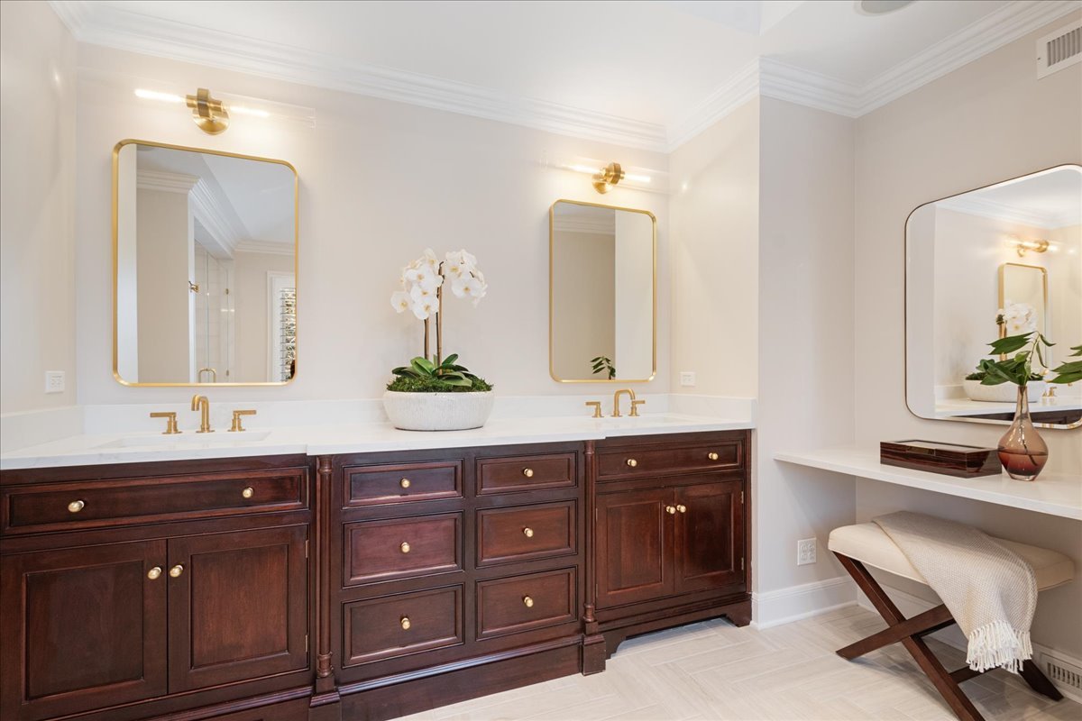 861 Bell Lane Winnetka, IL 60093 - Photo 35 of 57 a spacious bathroom with double vanity sinks and a mirror