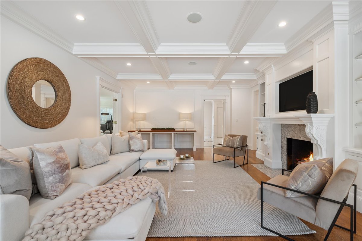861 Bell Lane Winnetka, IL 60093 - Photo 5 of 57 a living room with furniture a fireplace and a flat screen tv