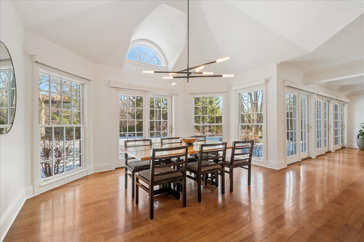 861 Bell Lane Winnetka, IL 60093 - Photo 9 of 57 a view of a dining room with furniture window and wooden floor