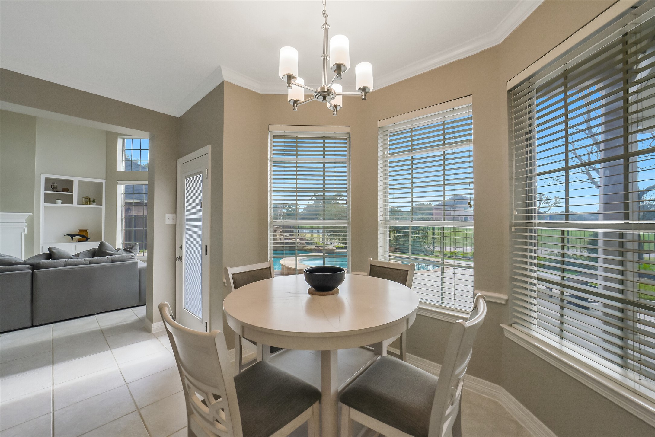24403 Falcon Point Drive Katy, TX 77494 - Photo 12 of 32 The breakfast nook offers a casual dining space, the door on the left gives you direct access to the beautiful backyard.
