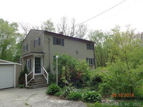 194 Middle Road Preston, CT 06365 - Photo 1 of 1 a front view of a house with a garden