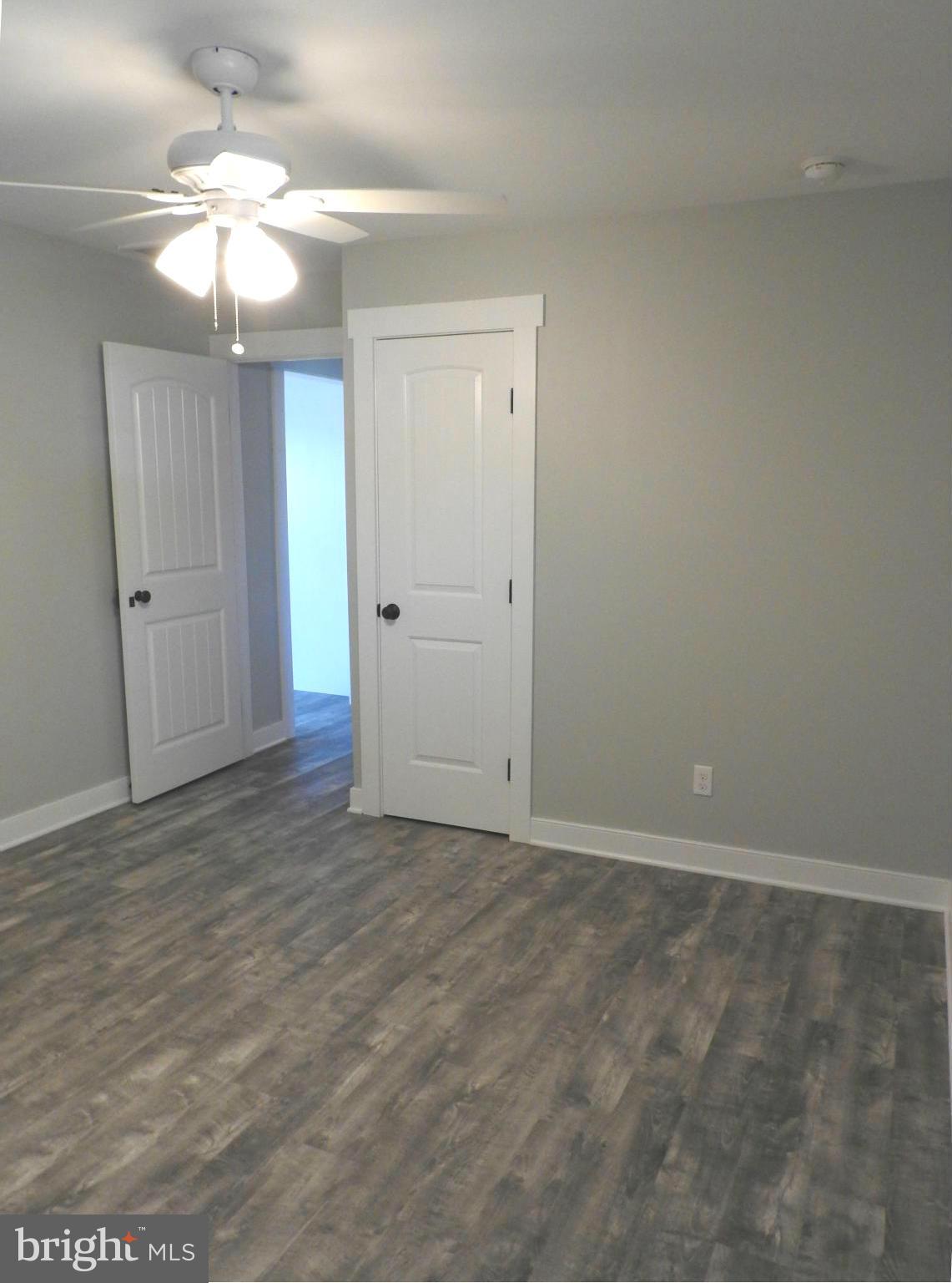 1540 Deep Point Road Woolford, MD 21677 - Photo 20 of 30 wooden floor in an empty room